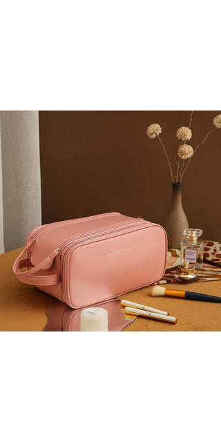 Stylish pink leather makeup bag with double zipper design and spacious interior for storing cosmetics and personal care items.