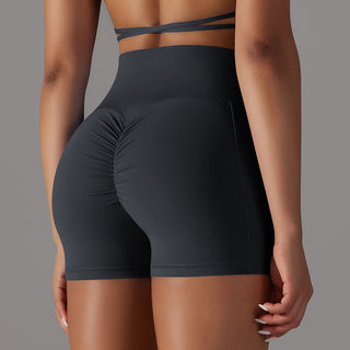 Sleek black yoga shorts with phone pocket design for active women's fitness clothing