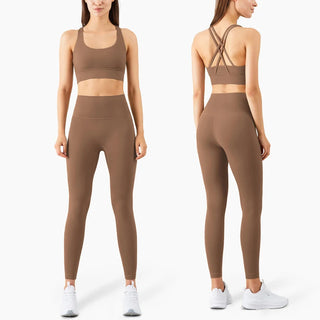 Stylish beige sports bra and high-waisted leggings from K-AROLE. The activewear set features a racerback design, figure-flattering silhouette, and seamless construction for maximum comfort during fitness activities.