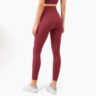 Vibrant burgundy fitness leggings with sleek, high-waisted design by K-AROLE™️