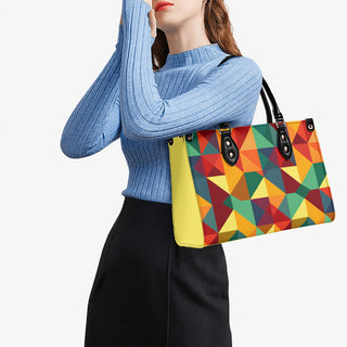 Colorful geometric patterned handbag, stylish woman wearing blue turtleneck sweater, sophisticated fashion accessories