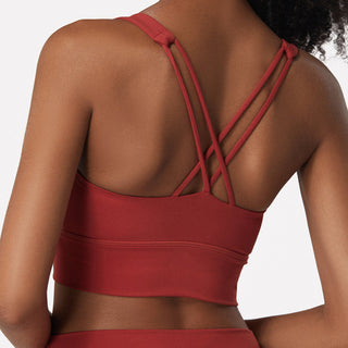 Cross-back sports push-up yoga bra in red with strappy back design