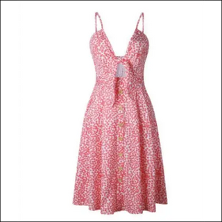 Stylish sleeveless backless summer dress with floral pink pattern, perfect for evening events.