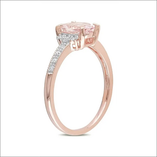 Elegant rose gold ring featuring a dazzling oval-cut morganite center stone surrounded by a sparkling diamond halo, for a timeless and sophisticated look.