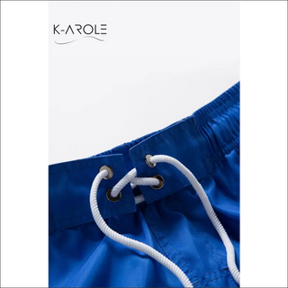 Trendy Women's Athleisure Shorts: Vibrant Blue Color Block Design with Functional Lace-Up Waist