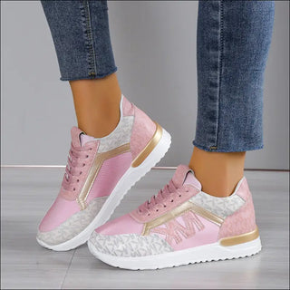 Stylish, comfortable pink and gold sneakers with a breathable mesh design and thick soles, perfect for casual or athleisure wear.