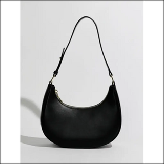 Stylish black underarm bag from K-AROLE - a sleek, compact messenger bag with versatile shoulder strap for modern women's athleisure outfits.