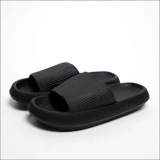 Experience timeless elegance with K-AROLE™ black slippers. These sleek and versatile slippers combine style and comfort, making them the perfect companion for any occasion