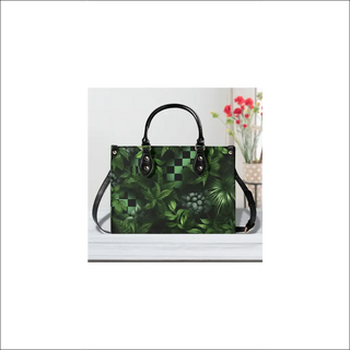 Artistic Elegance: Stylish PU leather handbag with unique tropical leaf design, perfect for chic, fashionable women.