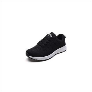 Stylish women's casual sneakers in sleek black and white design. Breathable mesh upper provides comfort and flexibility. Durable rubber sole offers traction for daily walking. Fashionable yet practical footwear for an active lifestyle.