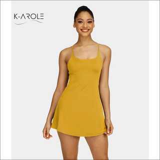 Woman's pocketed yellow tennis yoga running dress by K-AROLE