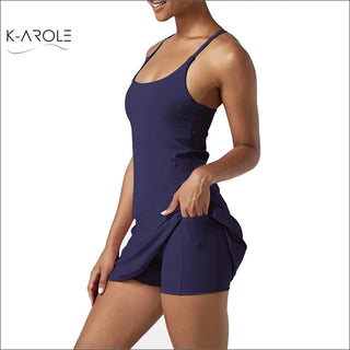 Stylish women's navy blue pocketed tennis, yoga, and running dress featured in the image from the K-AROLE store.