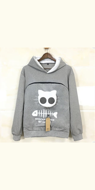 Cozy cat hoodie: Gray pullover hooded sweatshirt with playful cat graphic and contrasting white trim, perfect for keeping your feline friend warm and stylish.