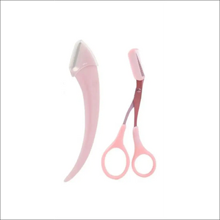 Elegant eyebrow trimming knife set in pastel pink tones, featuring a sleek trimmer and precise scissors for grooming and shaping eyebrows.