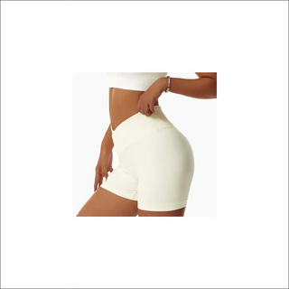 Tight, seamless white shorts for active women showcasing a toned, athletic figure.