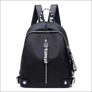 Stylish Black Backpack with Zipper Details and Graphic Prints