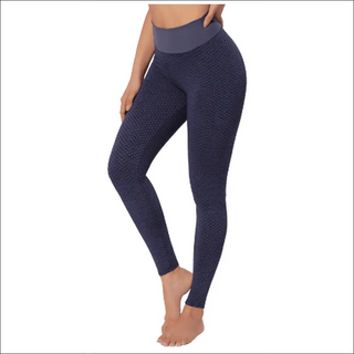 Stylish navy blue seamless leggings with textured pattern, designed for comfortable fitness and yoga workouts.