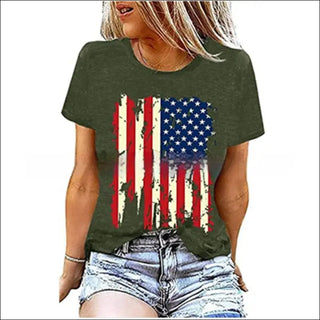 Stylish American flag graphic t-shirt for women, showcasing patriotic design with distressed stars and stripes on an olive green background.