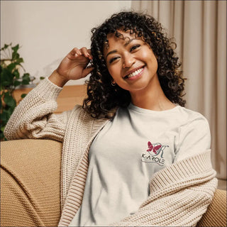 Relaxed, smiling woman in a cozy K-AROLE branded t-shirt