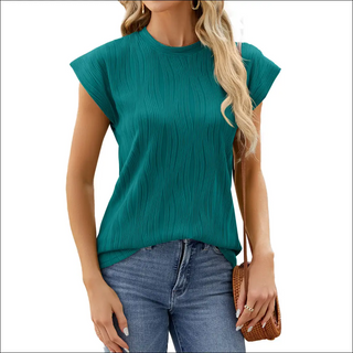 Women's pleated solid color crew neck teal green top in casual attire.