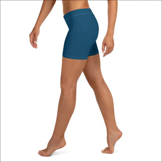 Teal-colored athletic shorts featuring a slim, form-fitting design for women's activewear.