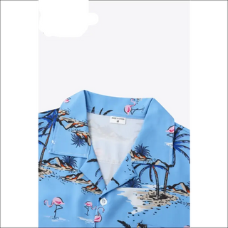 Tropical print collared pocket shirt in a blue tone, featuring vibrant palms and bird designs, showcasing a stylish athletic-inspired look.