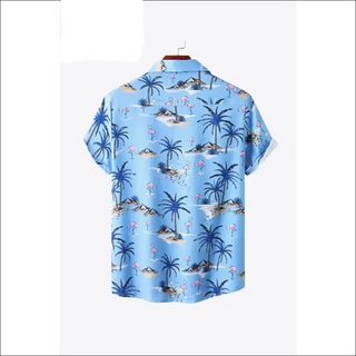 Tropical Print Collared Pocket Shirt: A vibrant button-down shirt featuring a tropical palm tree and island print pattern, ideal for women's athleisure wear from K-AROLE.