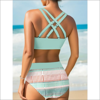 Strappy mint green bikini top, multicolor patterned high-waisted bottoms, stylish beachwear for women