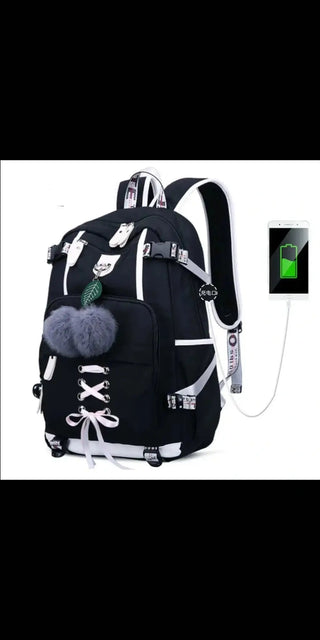 Stylish black women's backpack with external USB charging port and plush fur accent, perfect for everyday use or travel.